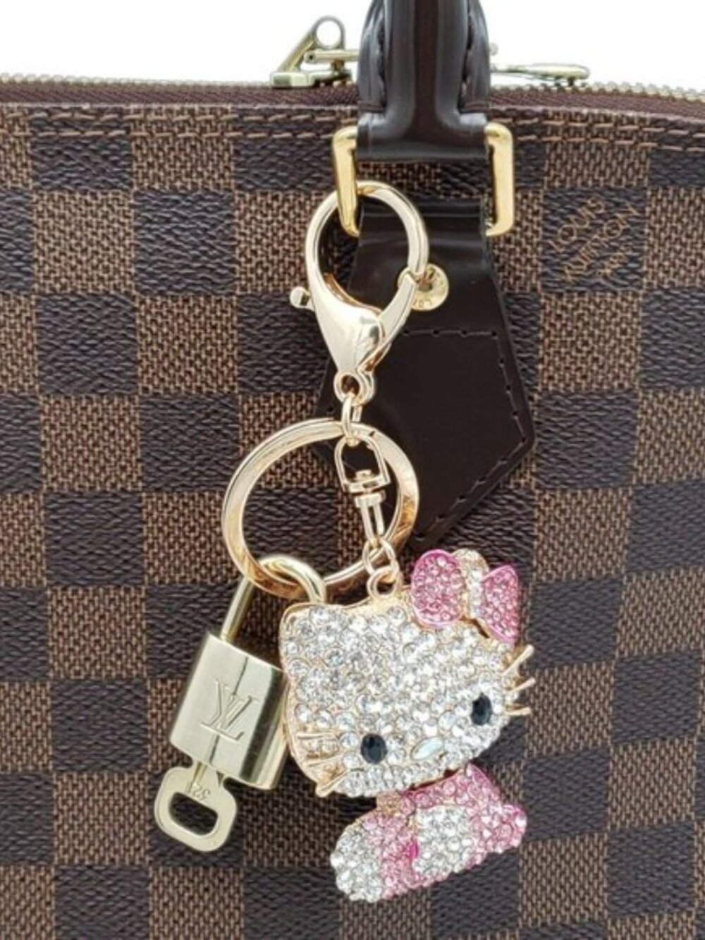 Louis Vuitton Gold Lock 🔒 Authentic LV Key + Unbranded Hello Kitty Bag Charm - Picture 8 of 8
